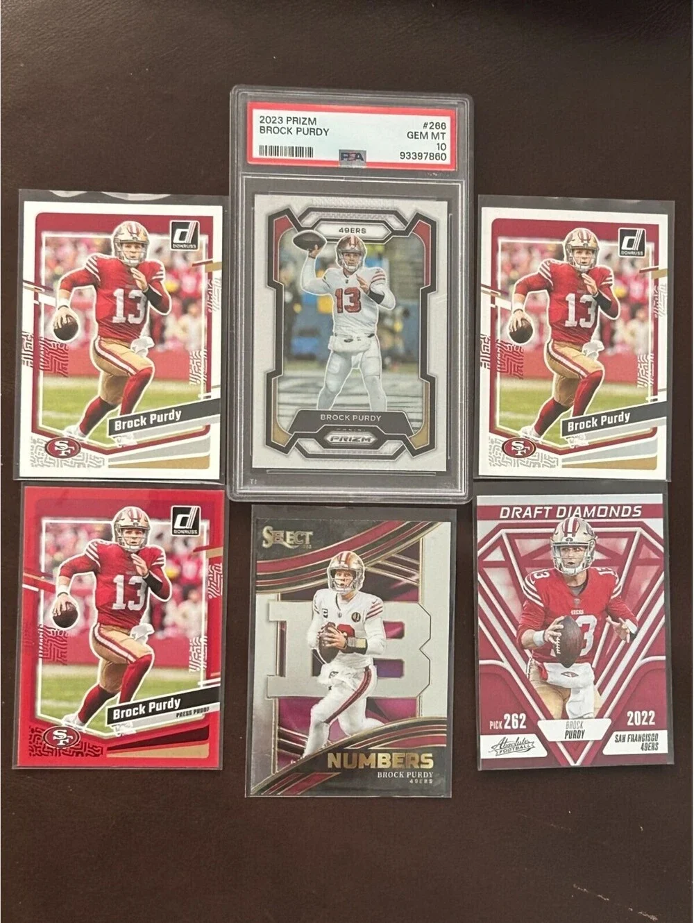 2023 Niners Brock Purdy Panini Prizm GEM MINT PSA 10 #266 + Red Press Proof